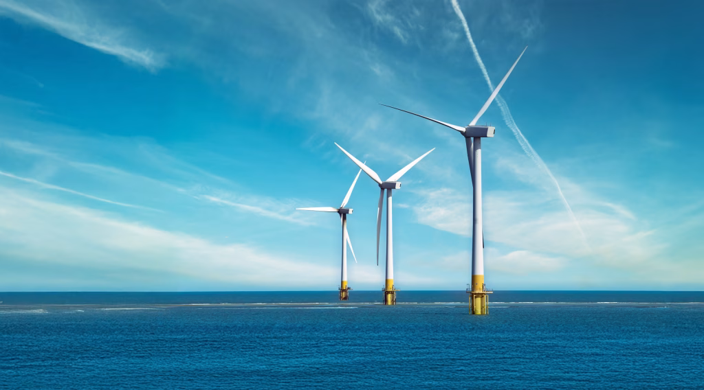 Image of three offshore wind turbines.